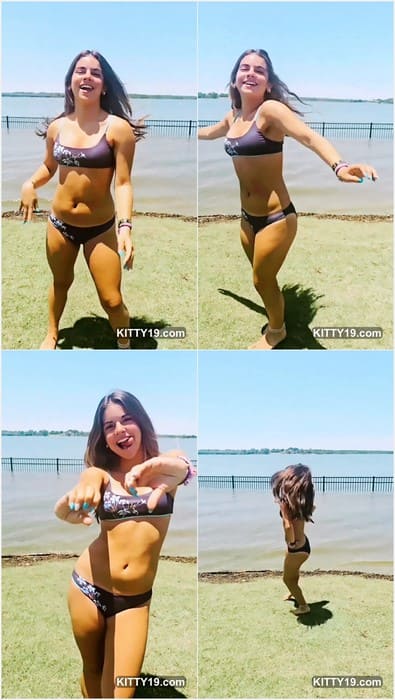 Mia Gonzalez tiktok young model dancing in bikini on the beach.