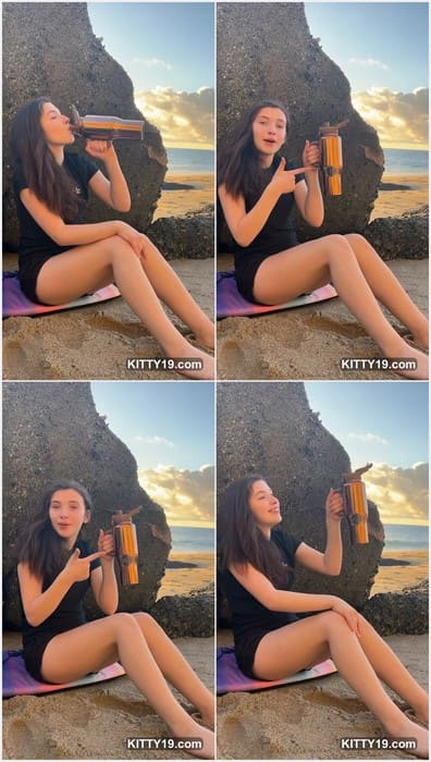 Cali Kira young starlet and beauty tiktok star sitting on the beach and showing her sexy face lips for you! Download it.